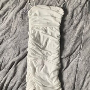 White skin tight dress.